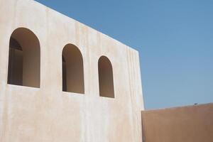Modern architectural design of a building with arches in daylight photo
