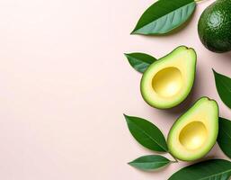 Fresh avocado on pastel pink background with free copy space for text photo