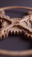 Looping animation of a mechanical construction made of wooden gears. Cyclic movement. Close-up. Vertical composition. Defocus. video