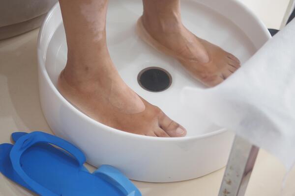 Relaxing foot soak in a spa setting during afternoon treatment