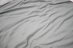Soft textured fabric draped on a surface creates a serene atmosphere photo