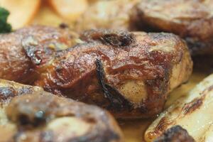 Delicious grilled chicken served with colorful vegetables photo