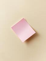 Minimalist workspace featuring pastel pink paper for creative design and organization photo
