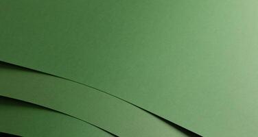 Paper background with matte texture. Layered curved stack in pastel green, grass green, and leafy photo