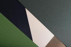 Matte designer paper texture with layered, diagonal composition. Elegant, smooth surface in soft photo