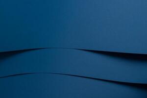 Matte designer paper texture with layered, curved arcs and smooth surface. Elegant, clean photo