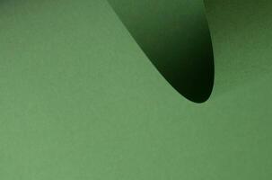 Matte designer paper texture with curled roll and smooth surface. Elegant, clean composition in soft photo