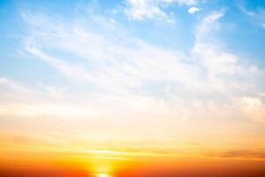 Beautiful , luxury soft gradient orange gold clouds and sunlight on the blue sky perfect for the background, take in evening,Twilight, Large size, high definition landscape . photo