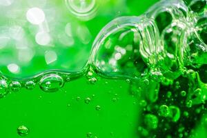 Water wave, close up of vibrant green liquid with bubbles, capturing dynamic movement and freshness. Perfect for backgrounds, beverages, or abstract concepts. soft dri. photo