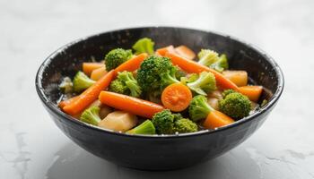 close up Bowl of Boiled Broccoli and Carrots on White Background, Healthy Vegetarian Food photo