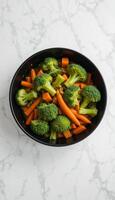 high anBowl of Boiled Broccoli and Carrots on White Background, Healthy Vegetarian Foodgle photo