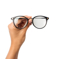 A close-up shot reveals a human hand delicately holding a pair of eyeglasses, showcasing the elegant design png