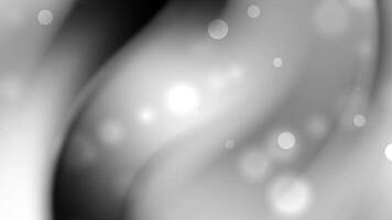 Smooth gradient background in grayscale with soft circular bokeh lights creating an abstract and dreamy effect video