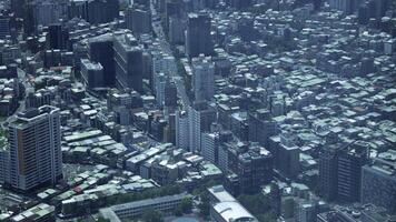 A timelapse of high angle view around Taipei101 skyscraper in Taiwan panning video