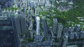 A timelapse of high angle view around Taipei101 skyscraper in Taiwan wide shot zoom video