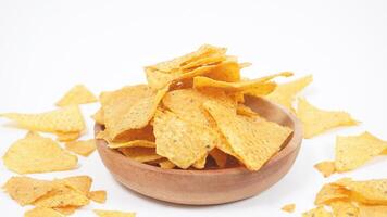 Nachos chips on a plate isolated on white background photo