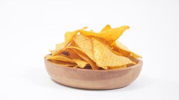 A plate of tortilla chips isolated on white background photo