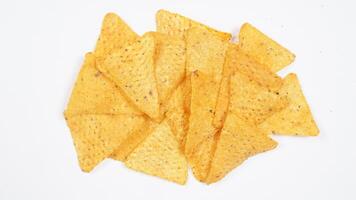 A bunch of tortilla chips isolated on white background photo