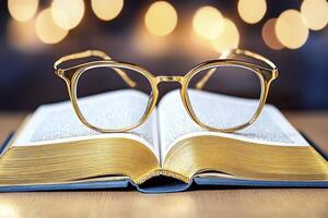 Gold Gilded Book and Glasses with Bokeh Lights photo