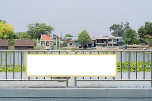 Blank large horizontal sign in front of the river bay. River bay with a blank sign for your text. photo