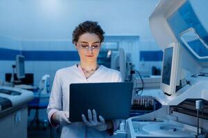 Woman portrait, scientist in lab, chemical engineer and forensics Using Computer. Development Center. Specialist Developing Innovative Medicine For Treating Mental Disorders Or Pain Relief photo