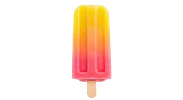 Frozen lemon treat with wooden stick on white background and shadow for summertime dessert and fruity snack ads photo