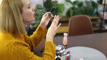 Creative makeup tips and tricks shared in a cozy urban setting for self-expression and confidence building video