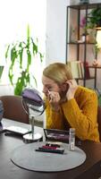 Crafting the perfect look indoors with creativity and flair while preparing for a special outing in a cozy setting video