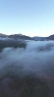 Aerial View of Mountains Covered in Mist video
