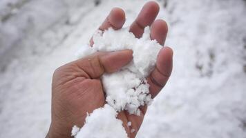 Creating snowballs in a winter wonderland video