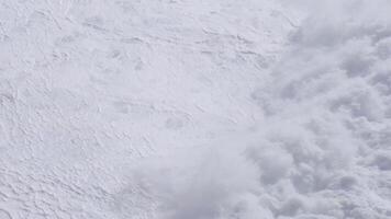 Controlled avalanche exploding on snowy mountain in serra da estrela, portugal video