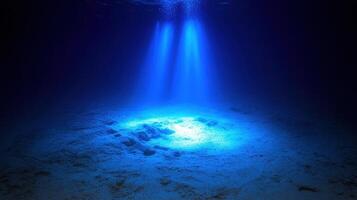 Ocean Depth Sunlight Piercing Through Submerged World of Serenity and Enigmatic Beauty photo