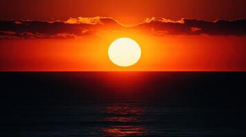 Oceanic Sunset A Fiery Sky Meets the Dark Waters Edge photo