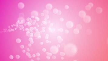 A flowing stream of smooth shiny spheres flowing towards the camera against a pink gradient background. This cute motion design is full HD and a seamless loop. video