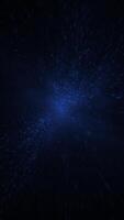 Shiny glittering blue particles motion background animation with shallow depth of field - cosmic stars or galaxy concept. Vertical animation. video