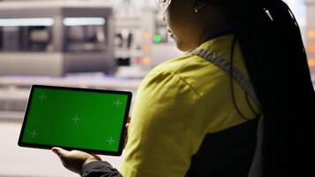 Smart factory specialist using green screen tablet to test automated systems to ensure reliability. Industry 4.0 plant technician using chroma key device to identify bottlenecks and optimize, camera B video