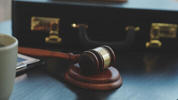 A judge's gavel and coffee cup on a desk video