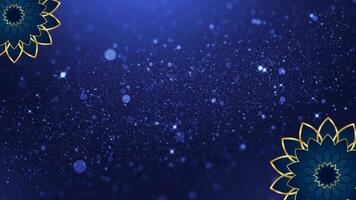 A blue background with gold flowers and snow video
