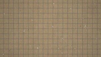 background paper grid texture stop motion animation. looping cardboard paper background texture video