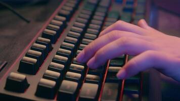 Close up female hand typing computer keyboard unknown woman business working online internet e-learning hacker programmer girl unrecognizable gamer game addict playing cyberspace datum neon video