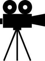 Classic motion camera on a tripod is presented in a simple black silhouette vector