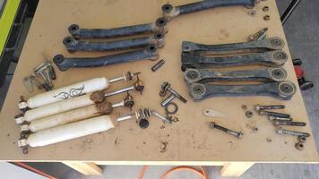Old Shocks and Control Arms for a 4x4 Vehicle, Suspension Upgrade photo