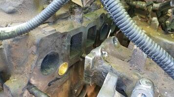 Working on a 1994 Vehicle, New Freeze Plug Installed on Engine Block photo