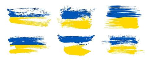 Ukrainian national flag in grunge style. Set of painted with a brush stroke flags of Ukraine. vector