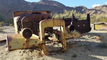 Old Abandoned Cars Rusting in the California Desert at Zzyzx photo