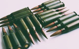 Perfect Square Of Bullets Isolated On White In Old Film Style Stock Photo