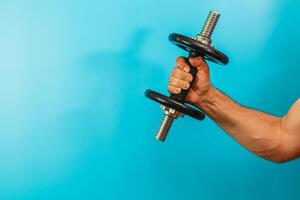 Weightlifting exercise with a dumbbell in a workout setting photo