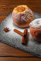 Sweet pastries on dark slate in a cozy spot photo