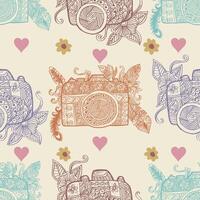 Seamless pattern with hand drawn retro camera, flowers and hearts. vector