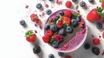 A bowl of chia pudding with berries and other fruits photo